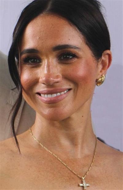 Meghan Markle wears Princess Diana's diamond cross necklace in Nigeria