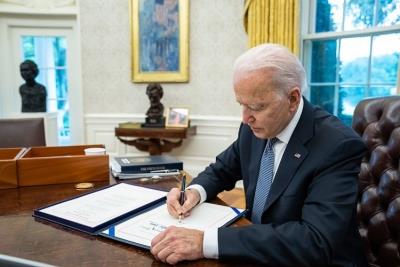 Biden signs executive order to curb unlawful border crossings by immigrants