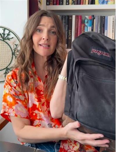 Drew Barrymore reveals what's in her bag as she launches summer travel edition