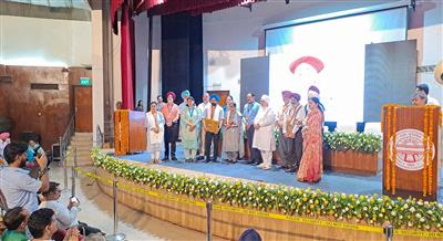 Chancellor Dr. Zora Singh honored the family of Surjit Patar
