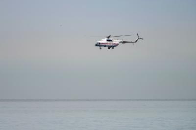 Coast Guard helicopter crashes in sea, search on for missing pilot