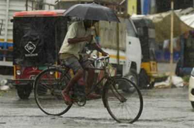 Rain brings brief respite from scorching heat in Assam