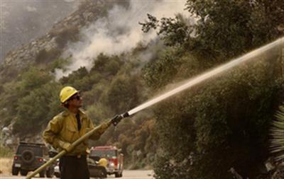 Two wildfires in US Wyoming burns over 130,000 acres