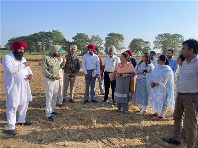 Deputy Commissioner Dr. Sona Thind in the fields, monitored the use of baler and rake