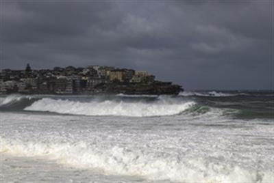 Storm hits Australia, causing property damage, flights cancellation