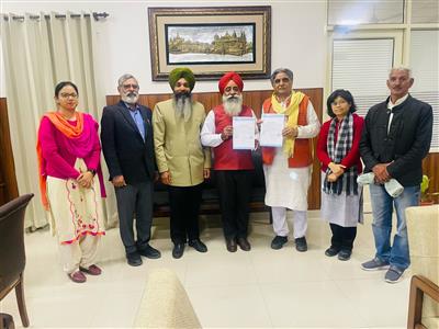 MoU between Sri Guru Granth Sahib World University and Kheti Virasat Mission